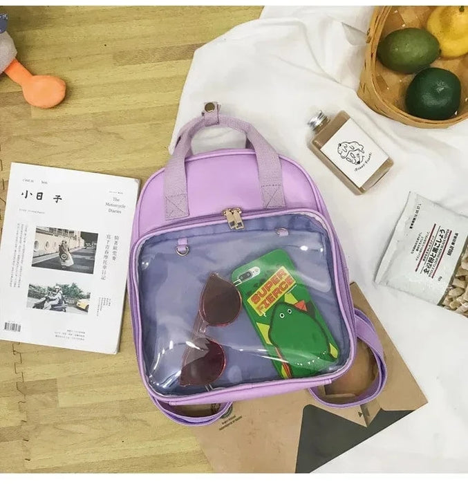 Lille børne rygsæk med gennemsigtig lomme purple